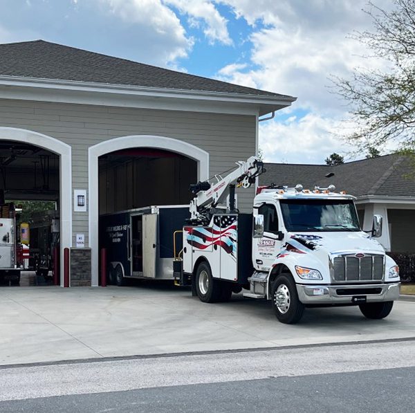 Lesslie-Welding-and-Fabrication-Fire-Truck-in-Front-of-Fire-House